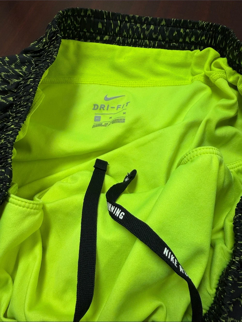 Nike Women’s Black and Neon Green Patterned Athletic Shorts